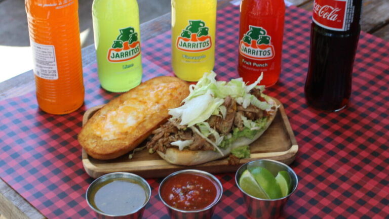Mexican tortas served with bottled drinks at Los Tacos Locos